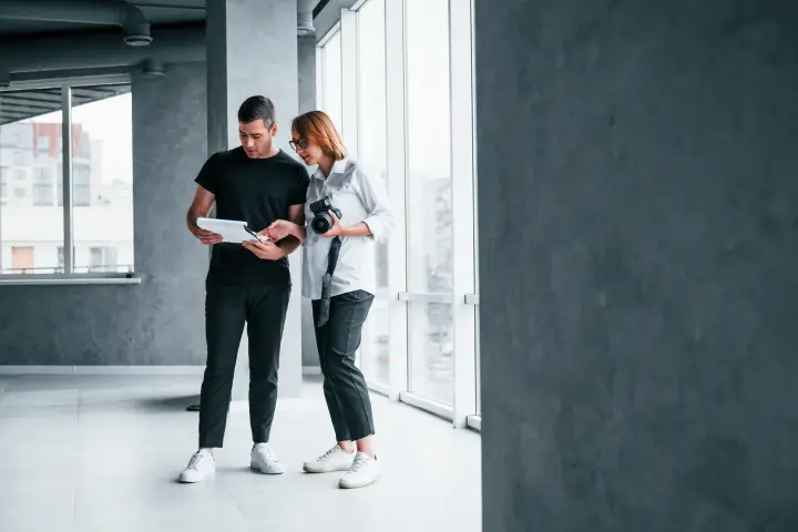 Team showing units to photographer