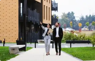 Broker showing apartment building to a tenant